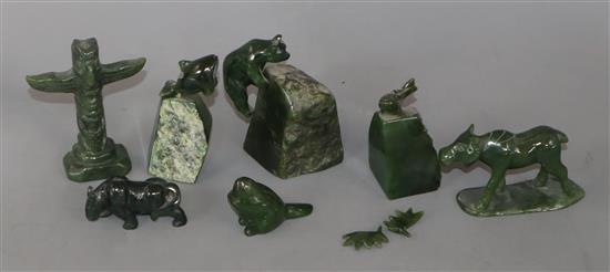 Seven Canadian green jade carvings of animals and a totum